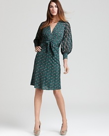 Billowy bishop sleeves lend dramatic flair to this otherwise ultra-sophisticated Issa London dress, boasting a rich print.