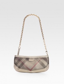 A slim bag crafted from check-print PVC with rich leather trim and a chic chain strap.Removable chain strap, 12 dropTop zip closureNylon lining9¼W X 4½H X 1½DImported