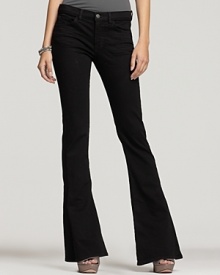 Bring back a vintage silhouette with elegance in these uniform wash J Brand jeans.