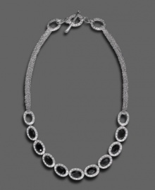 Dreamy design with artistic flair, by Monet. This gorgeous necklace features faceted glass beads set in silvertone mixed metal with pave crystal accents. Approximate length: 16 inches.