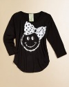 Don't worry, be happy, it's a cheery top with metallic smiley face and polka dot bow.ScoopneckLong sleevesPullover styleRound hem95% rayon/5% spandexHand washMade in the USA of imported fabric