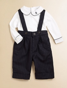 This essential set pairs a classic pinstripe overall with a soft cotton jersey bodysuit. Bodysuit Twill club collarLong sleeves with barrel cuffsBack buttonsBottom snaps Overall Adjustable shoulder strapsFront and back strap closuresCuffed hemCottonMachine washImported Please note: Number of buttons/snaps may vary depending on size ordered. 