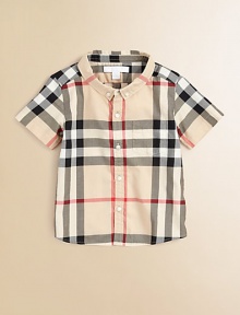 Fashioned in the renowned check design, this breezy cotton button-down features a shirttail hem and patch pocket.Button-down collarShort sleevesButton-frontFront patch pocketShirttail hemCottonMachine washImported Please note: Number of buttons may vary depending on size ordered. 