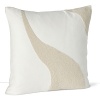 A soft wave of shiny beads against a neutral background adorn this decorative pillow from DIANE von FURSTENBERG.