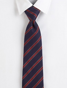 An understated version of a classic repp stripe in rich colors on pure silk.SilkDry cleanMade in Italy