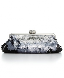 Add a little sparkle and shine with this special occasion clutch by Jessica McClintock. It won't be hard to steal the scene with this multi sequin design featuring shiny silvertone hardware and a refined top snap closure.