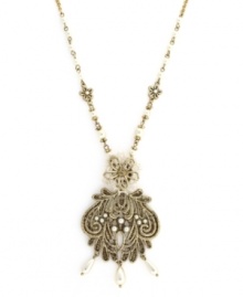 Frilly, fancy, and totally fashionable. Jessica Simpson's delicate drop pendant combines a lovely lace design accented by shimmering simulated pearl drops. Crafted in gold tone mixed metal. Approximate length: 30 inches. Approximate drop: 3-1/2 inches.