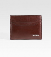 EXCLUSIVELY AT SAKS. A sophisticated option to the bulky wallet, designed in smooth leather with metal logo detail. Top-loading currency pocket Two card slots 4 X 3 Made in Italy 