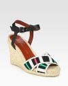 Multicolored grosgrain ribbon straps grounded by a classic espadrille wedge, finished with an adjustable leather ankle strap. Hemp wedge, 4 (100mm)Hemp platform, 1 (25mm)Compares to a 3 heel (75mm)Leather and grosgrain ribbon upperLeather lining and solePadded insoleImportedOUR FIT MODEL RECOMMENDS ordering one half size up as this style runs small. 