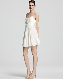 Turn heads in this strapless frock from Jill Stuart Dress, featuring a gorgeously ruched bodice and dramatic waist sash.