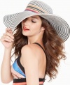 The fun in the sun never stops with the playful stripe design of this extra wide floppy hat from Nine West.