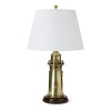 Fashioned after an old lighthouse, this lamp in natural brass gives some wanted maritime flare to any room.