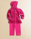 This adorable, coordinating set includes a zip-front hoodie with ruffled hem and matching sweatpants for a sporty, yet girly, ensemble. Hoodie Attached hoodLong sleevesFull-zip frontRibbed cuffs and hemSplit kangaroo pocketRuffled hem Pants Elastic waistband94% cotton/6% spandexMachine washImported