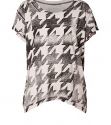 Channel of-the-moment style in this super soft graphic print tee from cult denim label Current/Elliott - Round neck, short sleeves, asymmetric hem, allover print - Relaxed silhouette - Style with favorite skinnies and edgy ankle boots