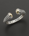 From the Palu collection, woven chain kick cuff with 22 Kt. gold rounded tips. Designed by John Hardy.