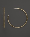 14K. yellow gold beads add fascinating texture and brilliance to classic hoops. By Lana.