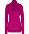 A contemporary feminine choice packed with wearing possibilities, DKNYs oversaturated cowl-neck pullover counts as a must for chic daytime looks - Oversized cowl neckline can also be worn off-the-shoulder, long sleeves, fine ribbed trim - Straight silhouette - Wear with everything from jeans and loafers to leather leggings and ankle boots