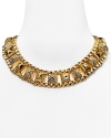 Juicy Couture crafts a cool-girl statement piece with this chunky chain link necklace, accented by a bold collar of pyramid studs.