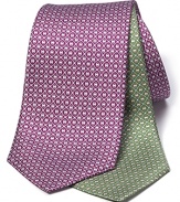 A delicate geometric pattern in luxurious silk adorns this handsome tie from Salvatore Ferragamo.