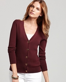 The search for the perfect cardigan is over, thanks to this Tory Burch ribbed cotton sweater in a just-right fit with a v neckline and golden logo buttons at the front.