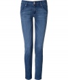 These flattering skinny jeans from Hudson add stylish appeal to your casual look - Wide waistband, two-button and zip closure, off-seam pockets, large belt loops, back flap pockets with button, skinny fit - Style with an oversized sweater or silk blouse and platform booties