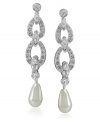 Grace and elegance combine in these flowing drops. Carolee earrings feature crystal droplets and two shimmery glass pearls crafted in mixed metal. Approximate drop: 1-1/2 inches.