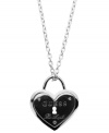 Sweet style that matches with anything. GUESS's adorable heart lock pendant features the company's signature logo. Crafted in silver tone mixed metal with jet epoxy and sparkling crystal accents. Approximate length: 30 inches + 2-inch extender. Approximate drop: 2-1/4 inches.