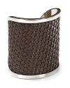 MICHAEL Michael Kors gives the classic cuff a high-texture makeover with woven leather. Wear it with all white for a standout statement accessory.