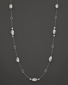 Gleaming, pebbled sterling silver beads alternate with oval links to form a dramatic necklace. From the John Hardy Kali Pebble colleciton.