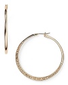 MICHAEL Michael Kors' rose gold-plated hoops are a versatile daytime detail. Pay attention to the finer points and wear these to add polish to sharp tailoring and sleek suiting.