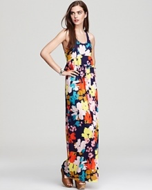 Imbued with a color-packed floral print, this Ella Moss maxi dress is accented with a peplum ruffle at the empire waist for a dose of feminine flourish.