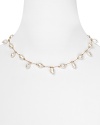 Margo Morrison's freshwater pearl necklace is a delicate detail. Designed to melt into the skin, this feminine piece will work just as well during the day as at night.