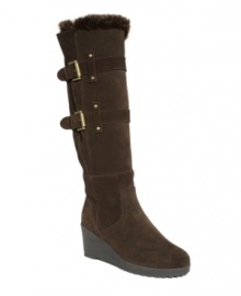 Even the most durable winter boots can look sleek and stylish, as demonstrated by Khombu's Rainbow! Crafted in waterproof suede, they feature a faux fur cuff, buckle hardware detailing and trendy wedge heel. Plush lining and a comfort insole with Thermolite for insulation will keep you warm and dry throughout the season.