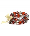 Chic combination. A complementary palette of red and gray enhances this chic double-row stretch bracelet from Jones New York. Set in hematite tone mixed metal, it's embellished with faceted plastic beads. The stretch design provides comfort and flexibility. Item comes packaged in a signature gift box. Approximate diameter: 2-1/2 inches.