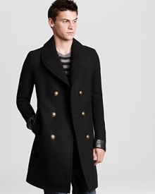 With an elongated silhouette, this leather-trimmed peacoat updates the classic for a sophisticated addition to your refined wardrobe.