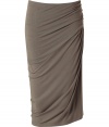 Luxurious skirt made ​.​.of fine, taupe rayon stretch - Crazy elegant with decorative draping - Fashionable wrap look - A mega glamorous version of the classic pencil skirt - Cut body-hugging, the hem ends at the knee - Super chic, super sexy, a dream of a skirt for women who know what they want - A smashing piece for business and important parties or events - In the office with an elegant blouse and pumps, in the evening with a sexy top and gladiator sandals