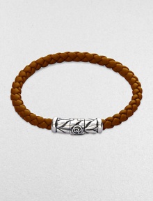 From the Weave Collection. Woven rubber is accented with an intricately engraved silver clasp.Sterling silver Rubber Width, about 5.5mm Length, about 7 Chevron clasp closure Imported