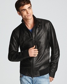 Complete your urban look with this sleek and sporty leather jacket from Diesel, crafted in smooth sheepskin and constructed with a classic silhouette for timeless masculine appeal.