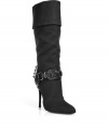 Stylish boots in black canvas - elegant and rocking shoe with slim fit - with decorative ankle buckle and rolled-up shaft - has a sttiletto heel, but is very comfortable and has good stability - typical bootie for in-between seasons - wear with the new long, full skirts or with leggings, skinny jeans - suitable for all smart and sexy looks - inner heel: 9 cm (3.5). outer heel: 12 cm (4.7) (measured in size 38 7 1/2)