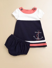 Set sail for this gorgeous, sailor-inspired frock in a classic a-line silhouette with anchor appliqué with matching bloomers.Boatneck with button detailShort sleevesBack buttonsA-lineStriped hemCottonMachine washImported