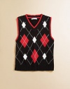 A classic knit vest is crafted in plush cotton and accented with a colorful argyle design.V-neckSleevelessPullover styleCottonMachine washImported