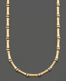 Simple style with a touch of the exotic. This bamboo necklace is crafted in 14k gold and sterling silver over sterling silver. Approximate length: 16 inches.