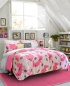 Dream in color. Various shades of peppy pink create an artistic flower design in this Poppy Dreams comforter set from Teen Vogue for a modern allure. Pair with a duo of decorative pillows and coordinating sheet set boasting whimsical polka dots.