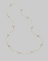 From the Akoya Collection. A delicate chain, sprinkled with lustrous white cultured Akoya pearls. 5mm white, round cultured pearls Quality: A+ 18k white gold Length, about 18 Spring ring clasp Imported