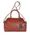 Ladylike looks get a sleek modern finish with See by Chlo?s chestnut leather tote, the perfectly practical choice for chic daytime looks - Roomy interior, top zip, adjustable shoulder strap, logo engraved luggage tag, inside zippered back wall pocket - Pair with bright, feminine separates and statement footwear