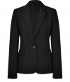 Update your office-ready favorites with this flattering tailored blazer from Theory - Notched lapels, long sleeves, single-button closure, flap pockets, fitted silhouette - Wear with a pencil skirt and a tie-neck blouse or wide leg trousers and a modern button down