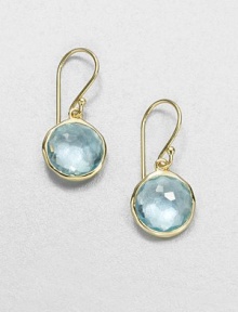 From the Lollipop Collection. Exquisitely faceted blue topaz drops, framed in gleaming 18k yellow gold. Blue topaz 18k yellow gold Drop, about 1 Diameter, about ½ Ear wire Imported