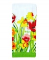 Fresh and vibrant, Vera's Daffodils towel turns even the hottest, darkest kitchens into the picture of spring. Watercolor blossoms thrive on pure cotton for a natural look and feel, keeping cooks happy and counters tidy.