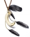 The trend is all about safari this season and Bar III's multi-charm style sets the look off with an ivory enamel horn and wispy black feathers. Crafted in gold tone mixed metal. Approximate length: 31 inches + 3-inch extender. Approximate drop: 7-1/2 inches.