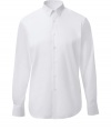 Classic shirt in fine white cotton - Slim silhouette with small collar, placket and long sleeves - Rounded hem with a longer back than front  - Favorite shirt for its simple elegance -  Great with a suit jacket and jeans, chinos or corduroys